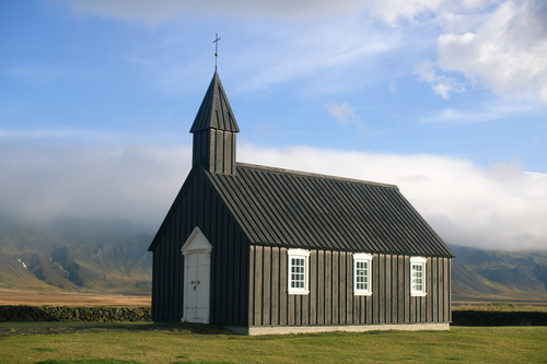 Black Wooden church in autumn in Budir, Iceland